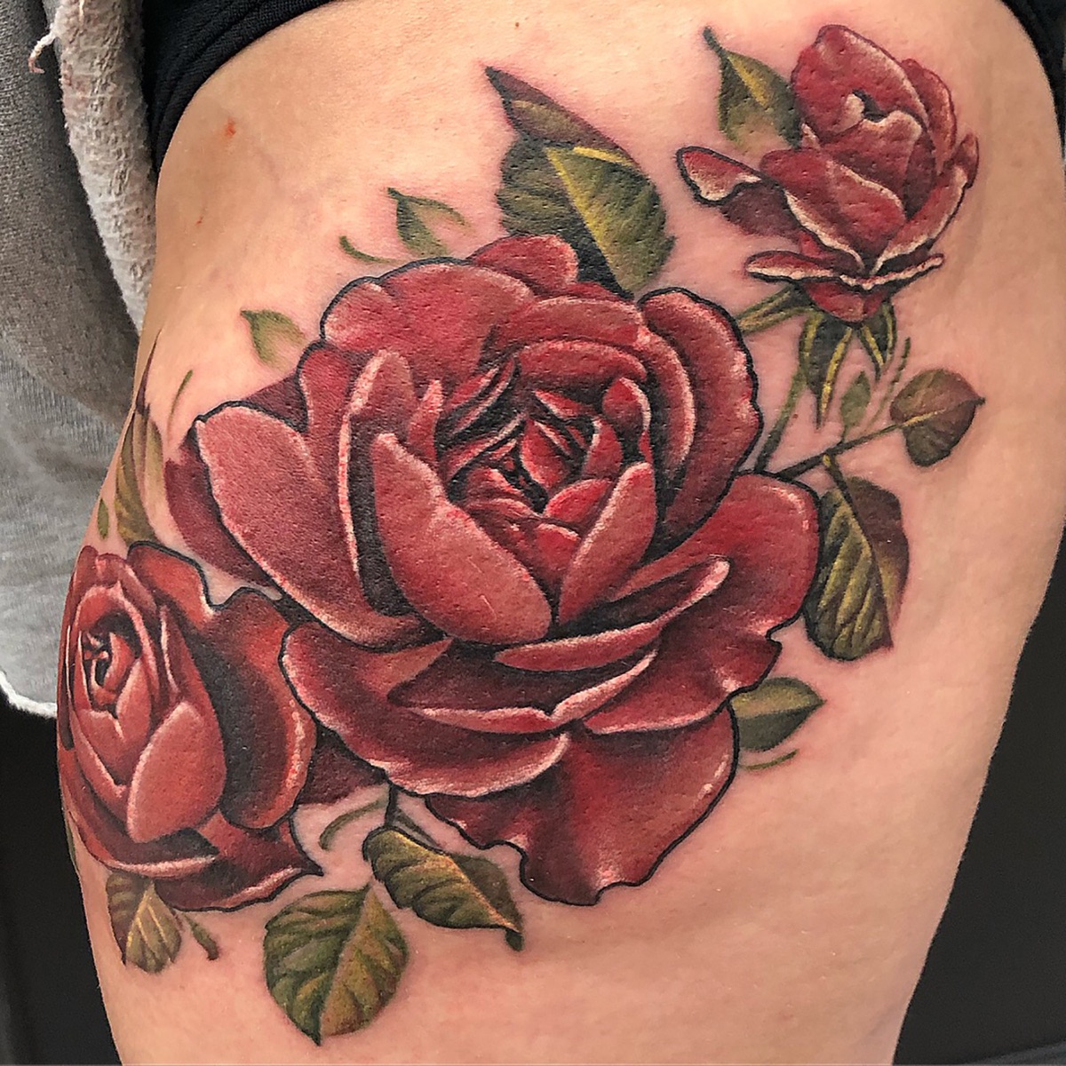 Realistic rose tattoo by Erin Burge